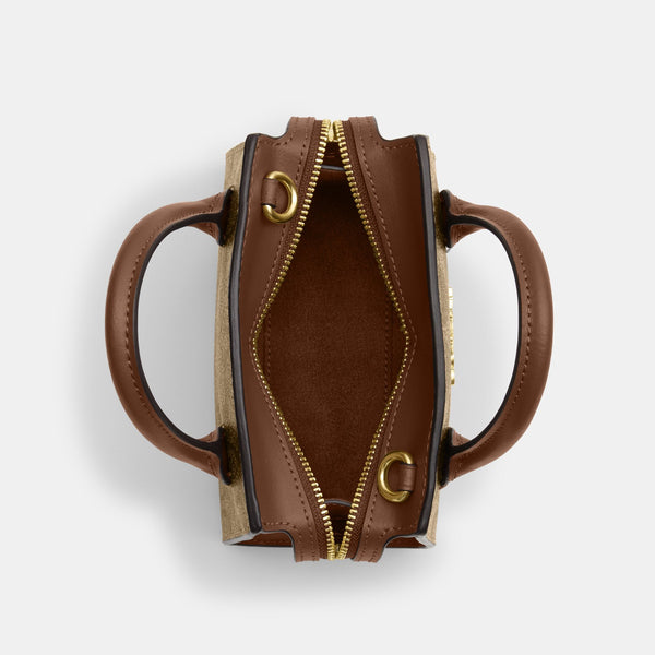 حقيبة كاريال "أندريا" بحجم صغير من القماش بنقشة كوتش