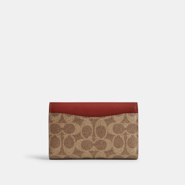 Essential Medium Flap Wallet In Signature Canvas