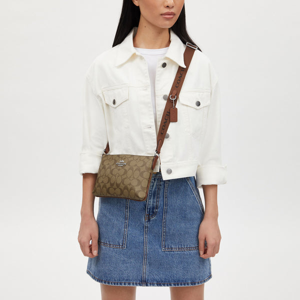 Pace Slim Crossbody Bag In Signature Canvas