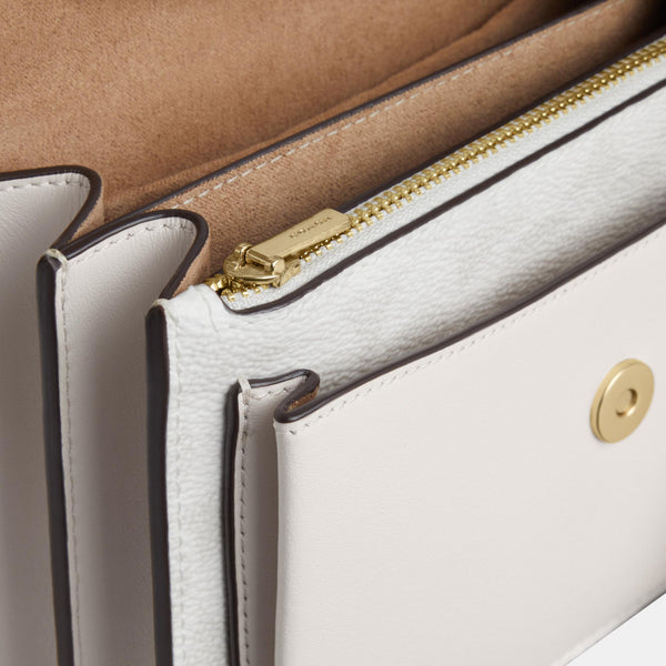 Mini Klare Crossbody Bag in Signature Canvas