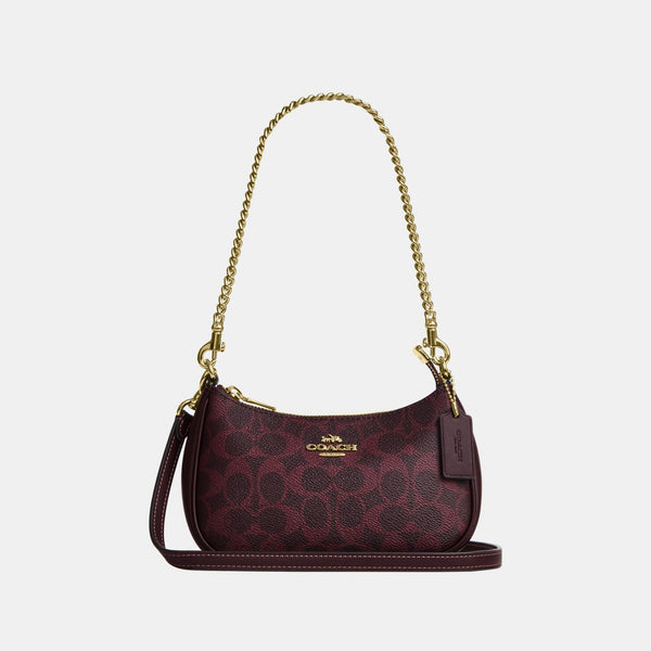 Teri Mini Crossbody Bag in Signature Canvas