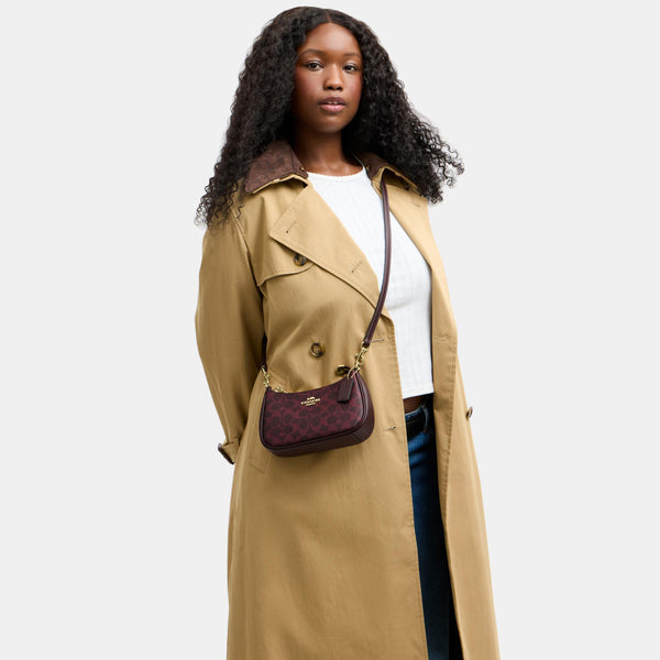 Teri Mini Crossbody Bag in Signature Canvas