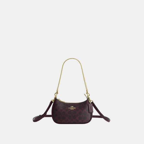 Teri Mini Crossbody Bag in Signature Canvas