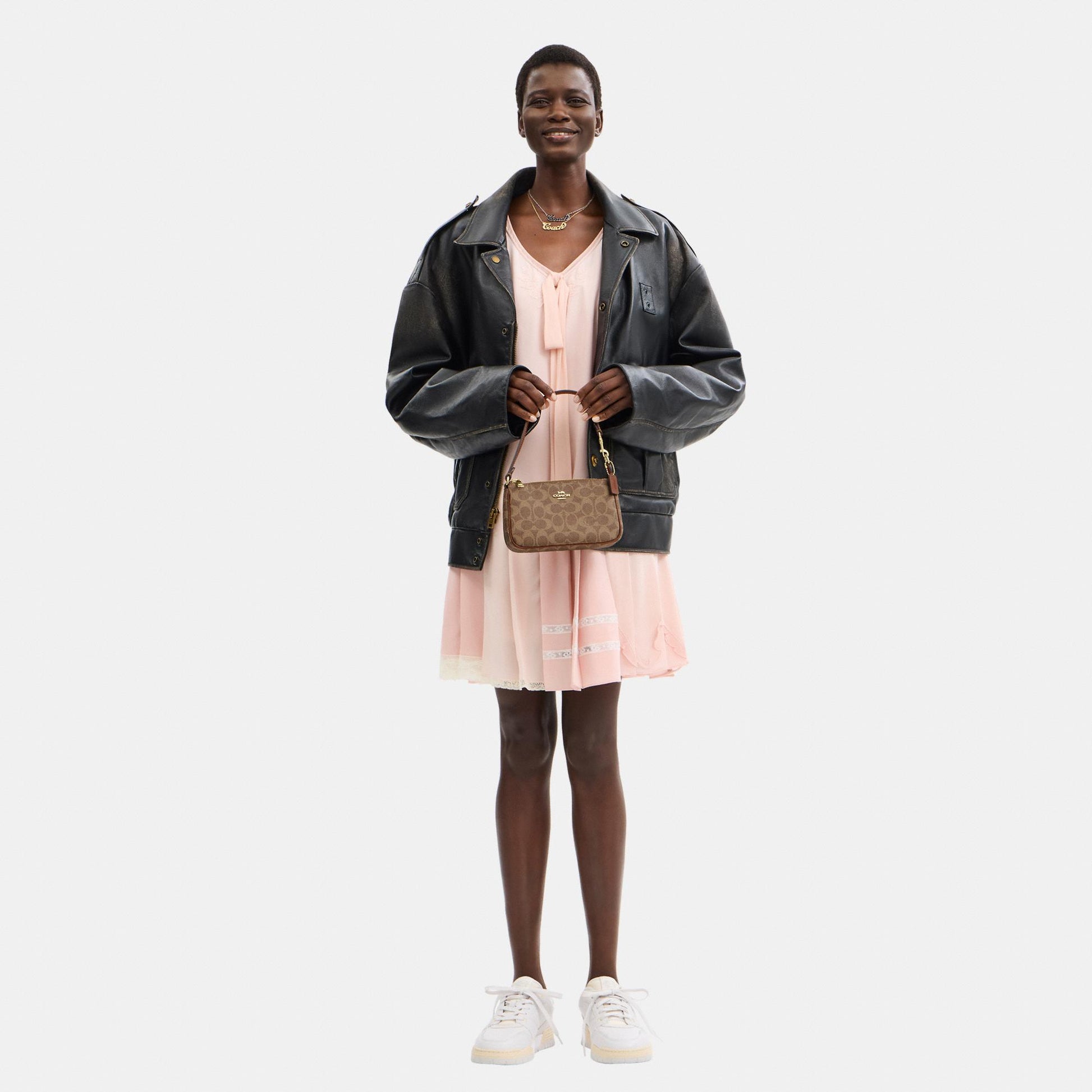 CW426-Nolita 19 in Signature Canvas-Im/Tan/Brown