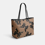 CY652-City Tote Bag In Signature Canvas With Bow Print-Sv/Tan/Black Multi