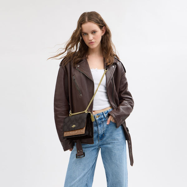 Klare Crossbody Bag In Blocked Signature