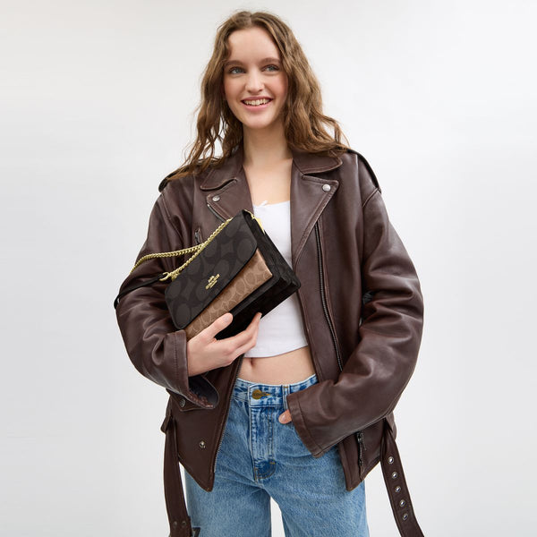 Klare Crossbody Bag In Blocked Signature