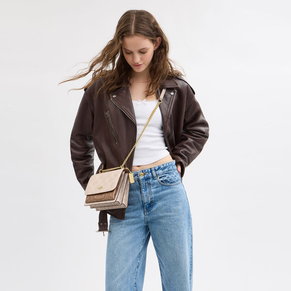 Klare Crossbody Bag In Blocked Signature