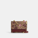 Mini Klare Crossbody Bag In Signature Canvas With Cherry Print