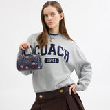 CY741-Mini Rowan Crossbody Bag In Signature Canvas With Cherry Print-Im/Denim Multi