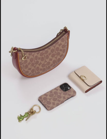 Mira Shoulder Bag In Signature Canvas