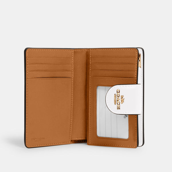 Medium Corner Zip Wallet In Signature Canvas