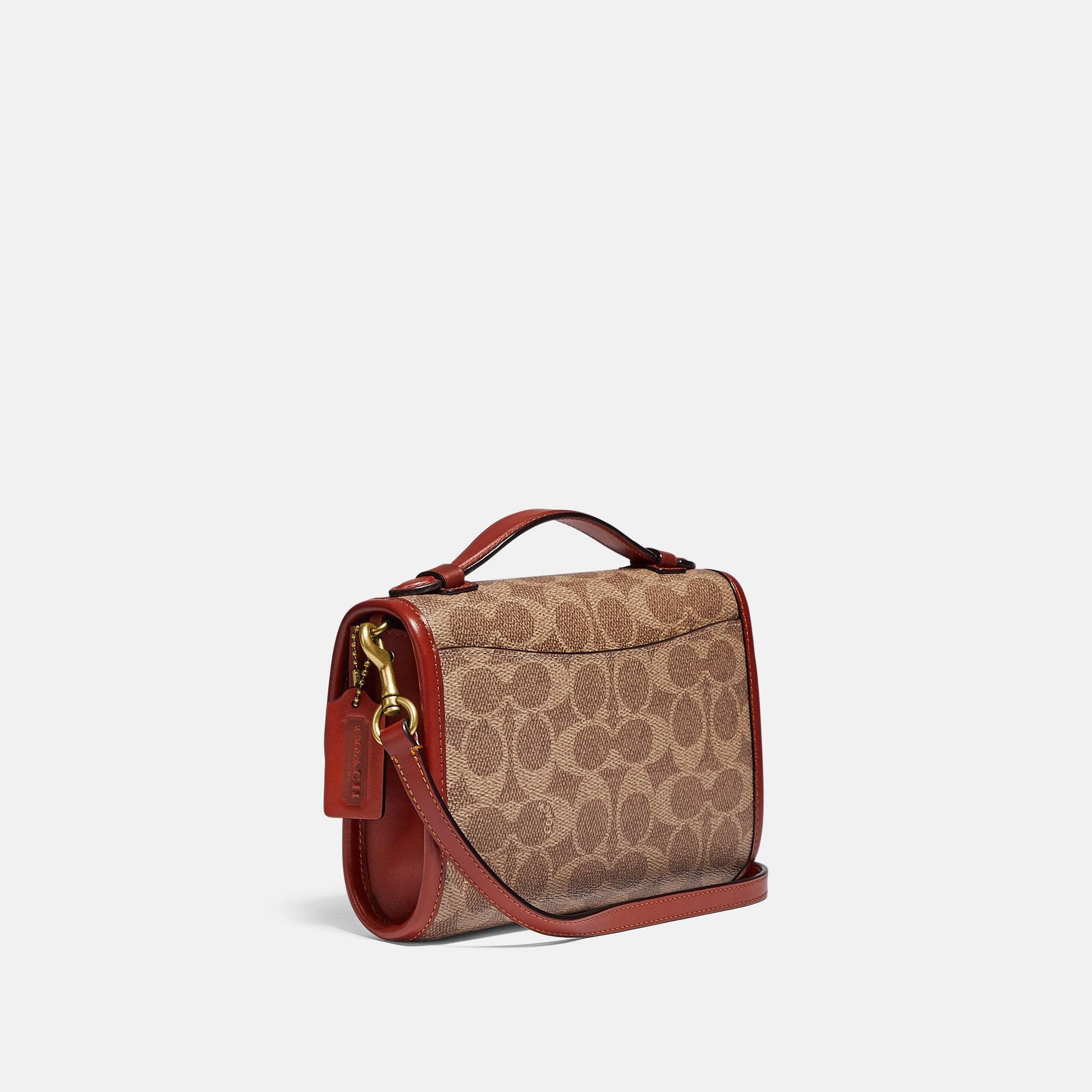 Kip Turnlock Crossbody In Signature Canvas - COACH Saudi Arabia Official Site