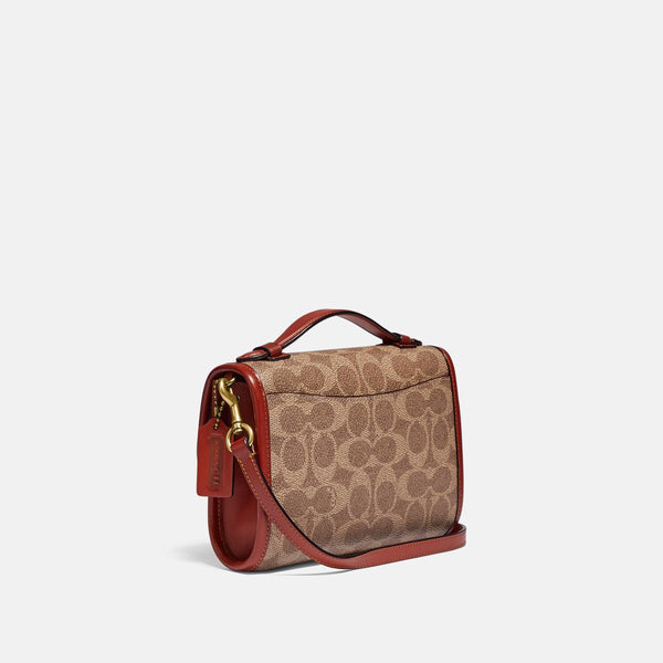 Kip Turnlock Crossbody In Signature Canvas