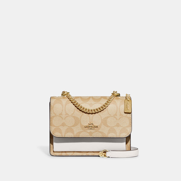 Mini Klare Crossbody In Signature Canvas