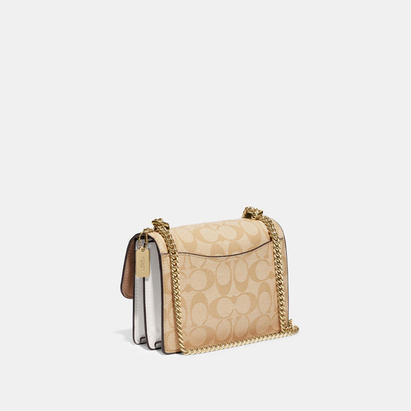 Mini Klare Crossbody In Signature Canvas