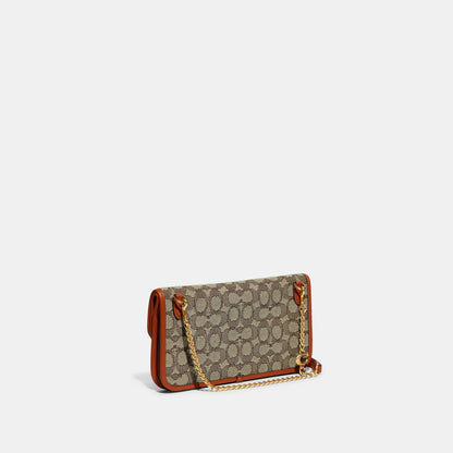 Foldover Cut Out Clutch Crossbody In Signature Jacquard - COACH Saudi Arabia Official Site