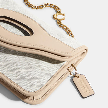 Foldover Cut Out Clutch Crossbody In Signature Jacquard - COACH Saudi Arabia Official Site