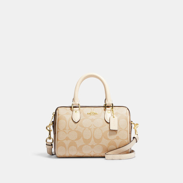 حقيبة "روان ساتشل Rowan Satchel" بحجم صغير من القماش بنقشة ماركة كوتش المقسم بالألوان