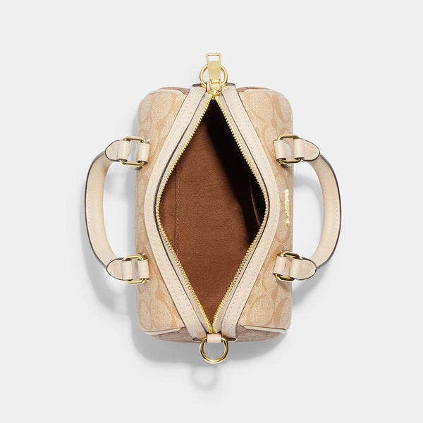 حقيبة "روان ساتشل Rowan Satchel" بحجم صغير من القماش بنقشة ماركة كوتش المقسم بالألوان