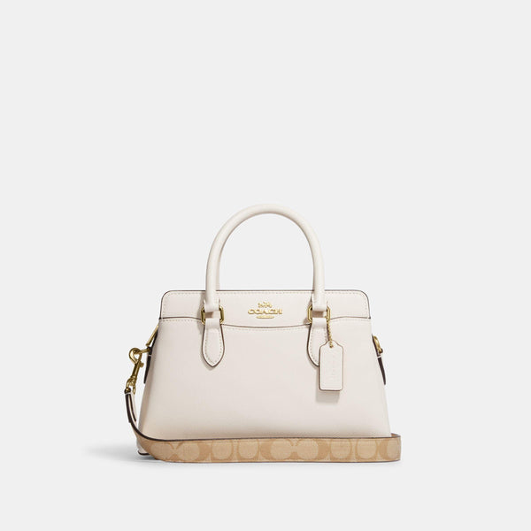 حقيبة "دارسي كاريال Darcie Carryall" بحجم صغير بتفاصيل من القماش بنقشة ماركة كوتش