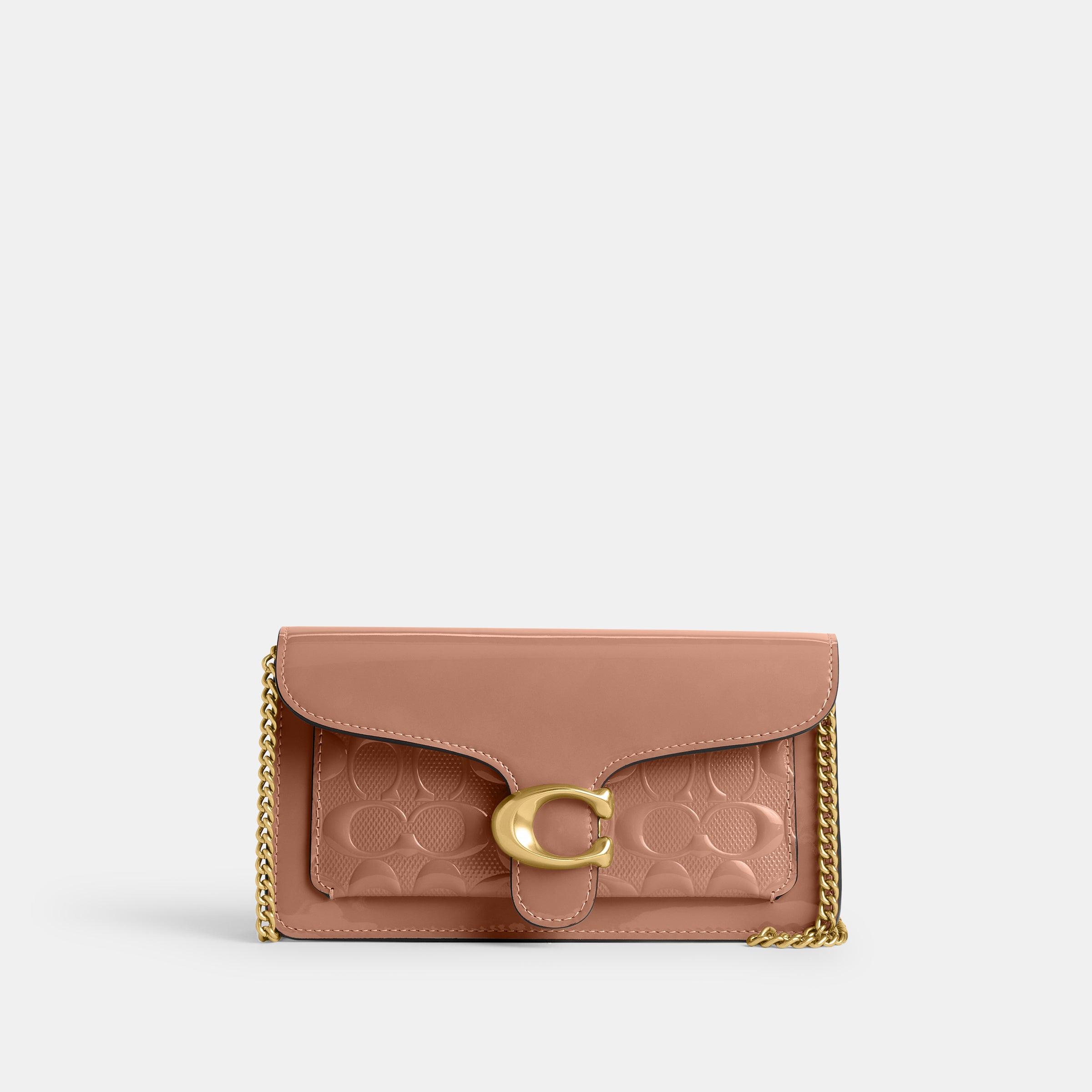 Coach clutch in signature leather sale